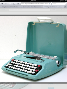 This is a Smith-Corona portable manual typewriter. I remember using one of these when I was growing up. Clack, clack, clack. Ding.
